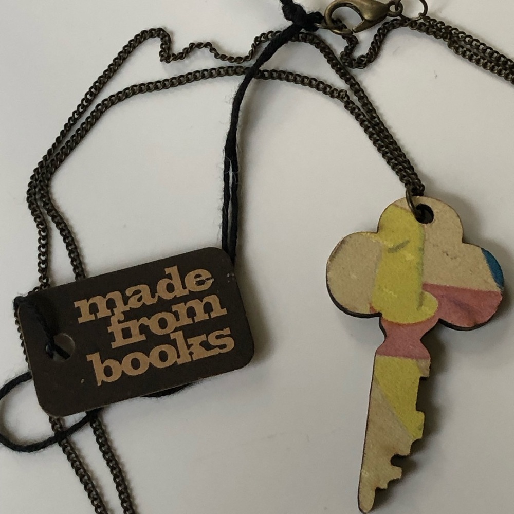 NWT Key shaped pendant necklace on 30” chain, made from reclaimed book covers